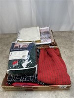 Assorted linens, some appears to be new in