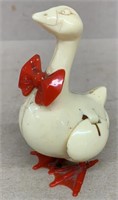 Celluloid duck egg laying toy