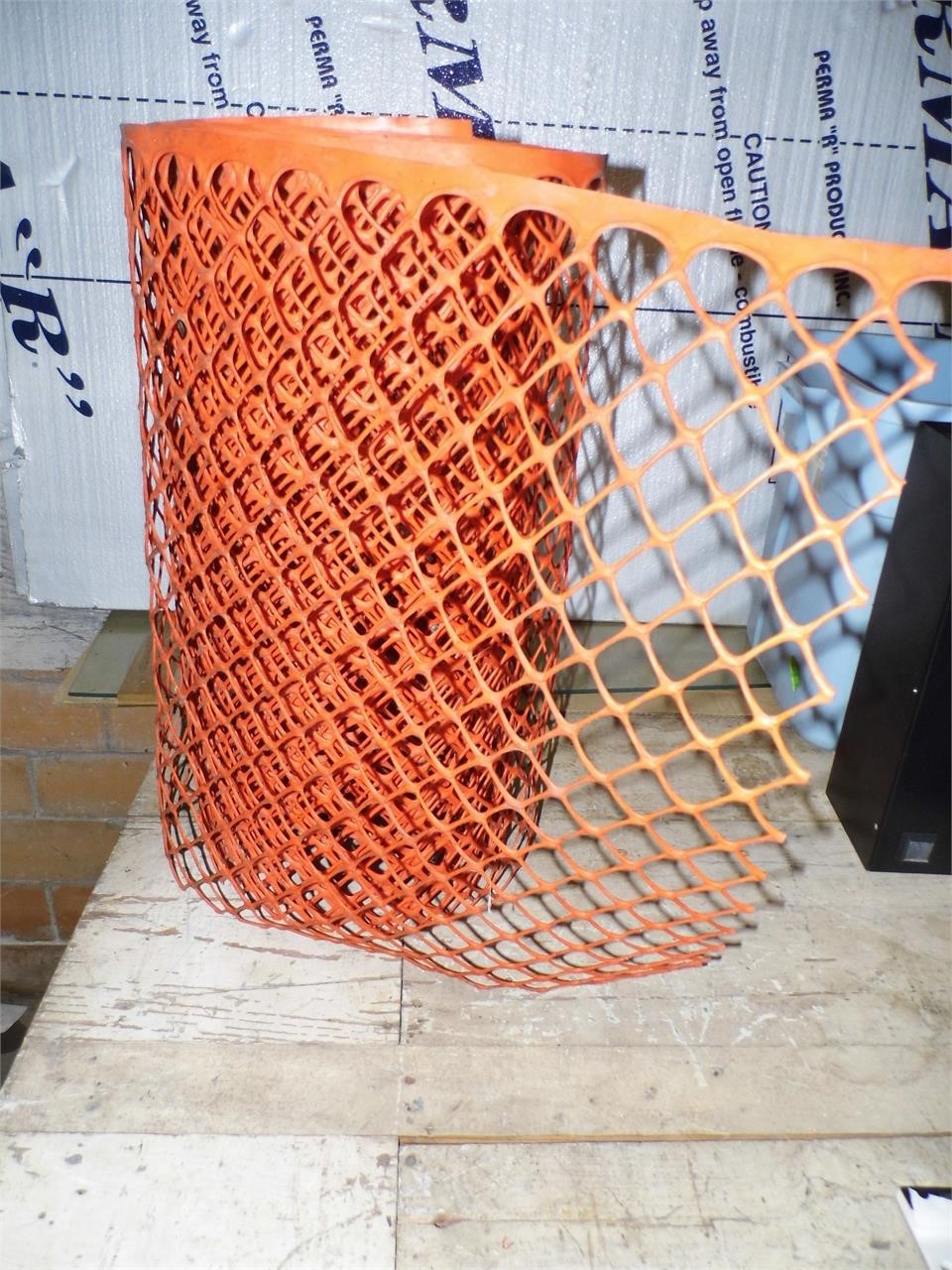Pc Of Orange Plastic Netting