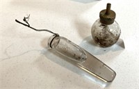Pair of glass items found in a farm shed