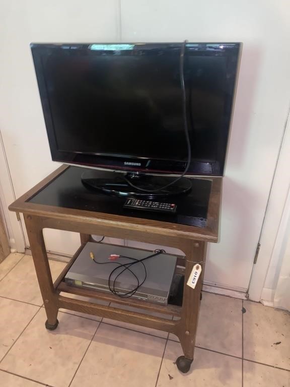 Samsung tv. W/remote Rolling stand Sony DVD PLAYER