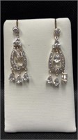 $230 Silver colored earrings