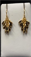 Gold coloured earrings