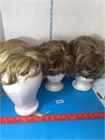 Ladies wigs and hairpieces with styrofoam stands