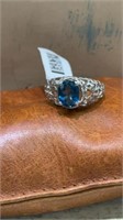 Sterling Silver and Oval Blue Topaz Ring. Size