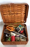 Picnic basket styled sewing kit with contents.