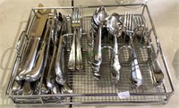 Stainless cabinet organizer filled with stainless