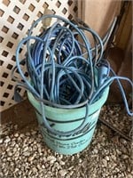 PAIL OF EXTENSION CORDS