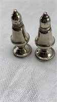 Pair of Sterling silver pepper shaker pots