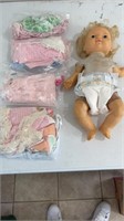 Antique baby doll and handmade baby doll clothes
