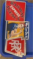 Assorted tin signs