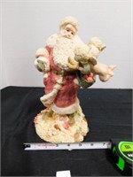 resin Santa statue with two angels