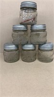Kerr self sealing squatted jars