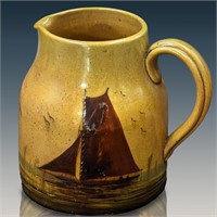 An Antique English Pottery Pitcher Painted With A