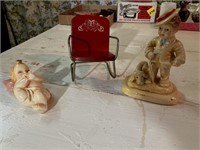 Toy metal chair and figurines