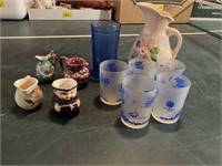 Vintage cream pitchers and glasses