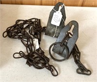 Lot: length of cow chain; and cow kickers.