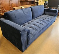 Chic Navy Blue Sofa with Bolsters