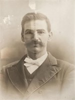 Portrait of Man in Carved Frame