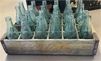 Embossed Coca-Cola Bottles in Wooden Crate