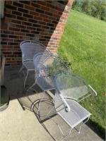 3 white metal patio chairs