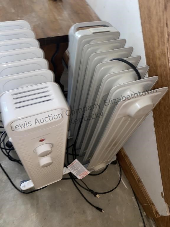 2 space heaters see photos
