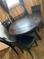 Round table and four chairs