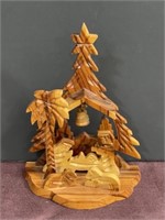 Wood carved nativity manger