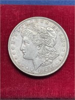 1921 silver Morgan Dollar coin in case