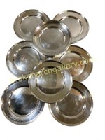Eight Sterling Bread Plates
