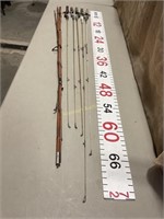 Five fiberglass rods and one cane bamboo pole.