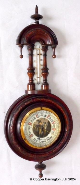 A Victorian Carved Walnut Aneroid Barometer