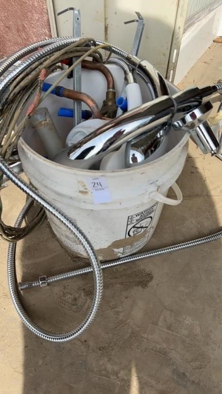 Plumbing items in bucket