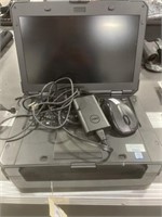 Dell laptop with mouse and charging cords