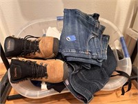 TUB OF CLOTHES WITH A PAIR OF BOOTS