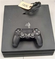 PlayStation 4 with controller