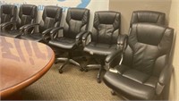 Eight office chairs