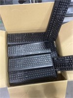 Box of assorted keyboards