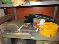 Shelf of misc garage items