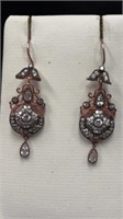 Copper coloured earrings