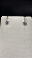 $40 silver coloured studs