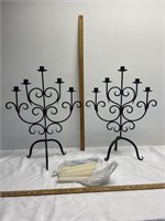 2 Metal candelabras with candles