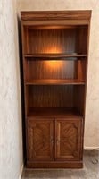 Tall  Pecan bookbookcase/curio with lights