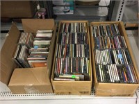 Assorted music CDs.