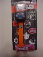PEZ NHL Edmonton Oilers ice hockey puck, sealed