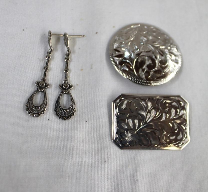 Two sterling brooches and earrings stamped