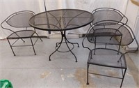Wrought-iron table and 3 chairs