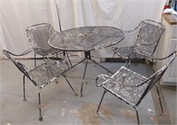 WROUGHT-IRON TABLE AND 4 CHAIRS