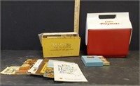 cookbooks w/McCall's carrier,playing cards,cooler