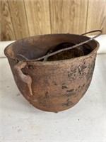 Cast iron cauldron, garden tool heads axe heads,